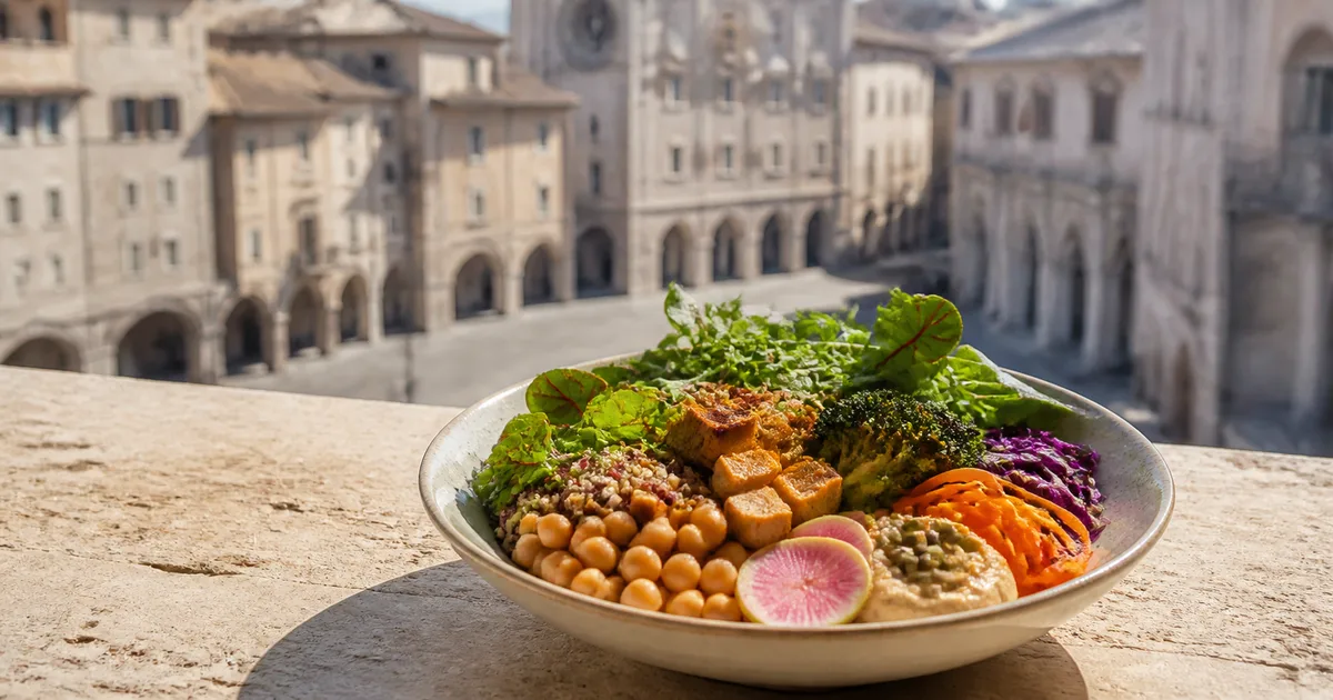 Piatto vegano completo con legumi e verdure in un'ambientazione di Foligno